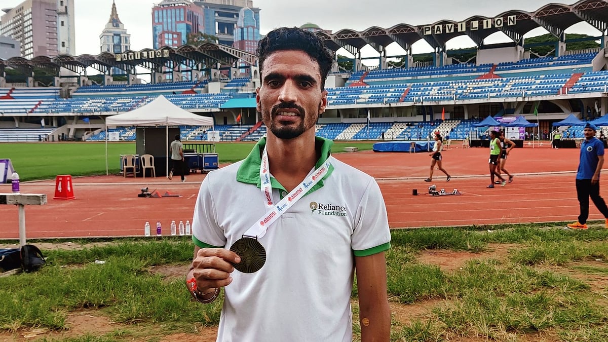Photo: X | nnis Sports : Gulveer Singh with his medal at the National Open Athletics Championships.